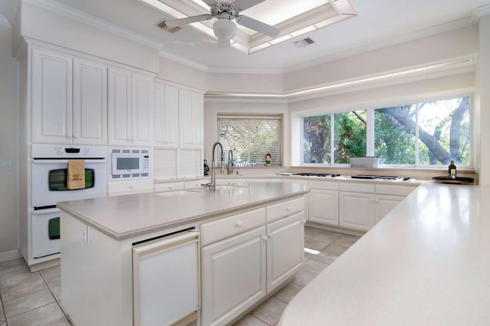 large kitchen has enough counter space for the entire group to help with meal-prep