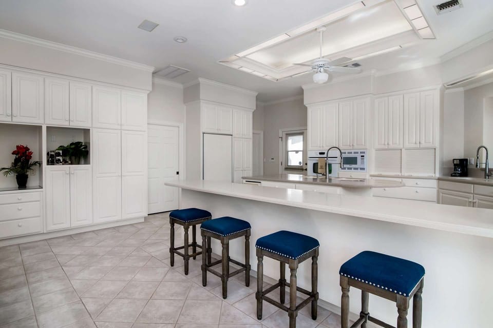 Large, open kitchen with bar seating - perfect spot for the afternoon snacks