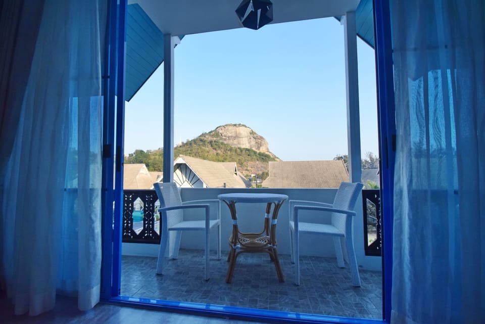 small balcony at 3rd floor bedroom with view of Khao Takiab mountain.