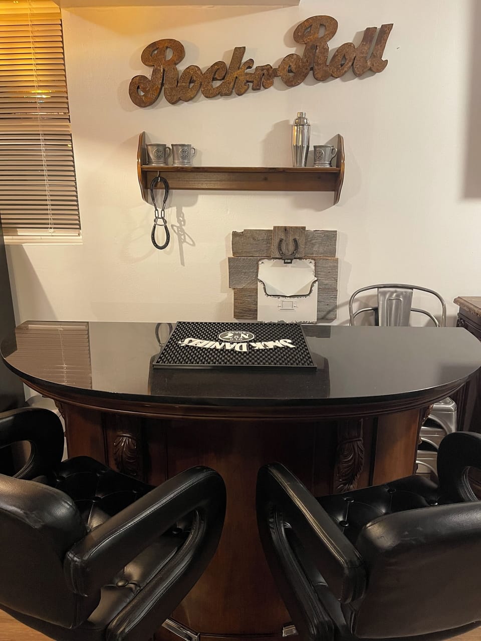 Bar area with fridge in rec room