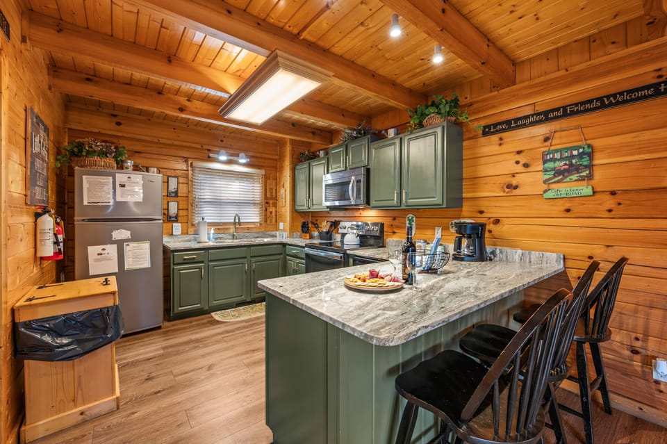 Gourmet Dreams: Granite Counters & Full Suite of Appliances and Utensils