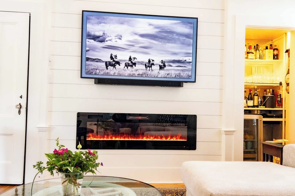 West Wing fireplace Samsung Frame TV & Honor Bar