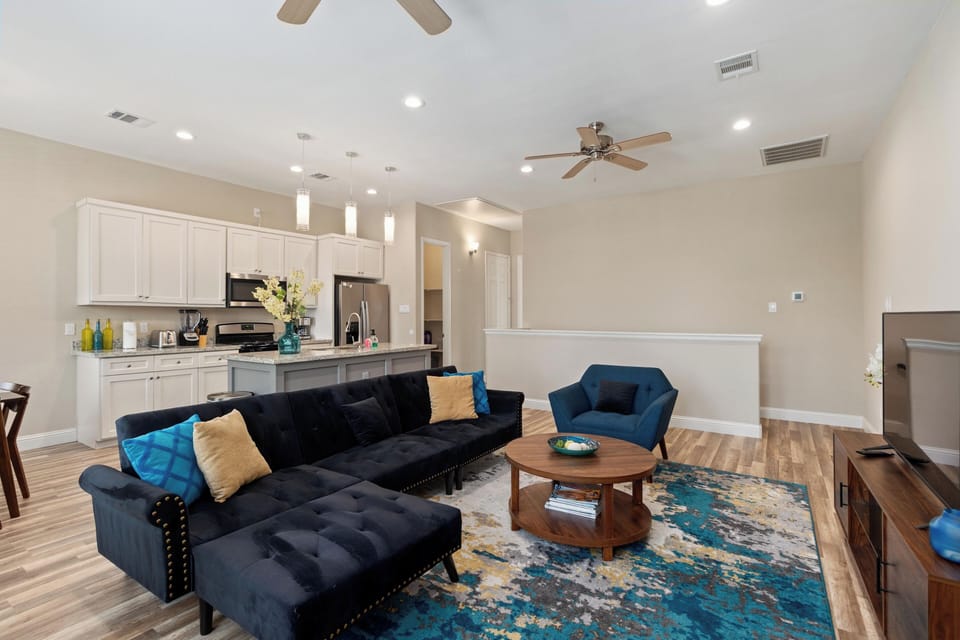 Open living area including double-twin convertible sofa.