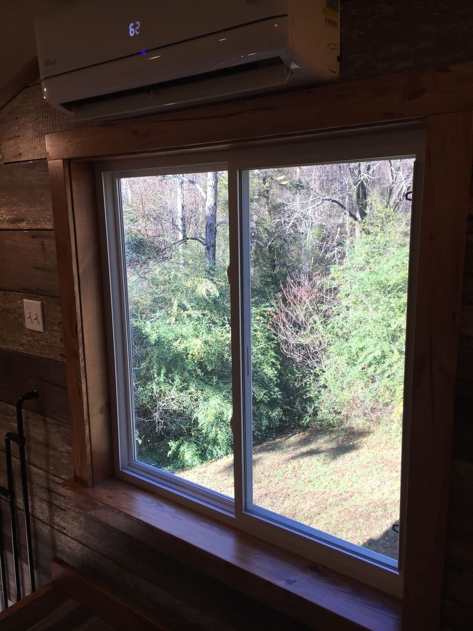 View out bedroom window. Window has light blocking shade (not pictured).