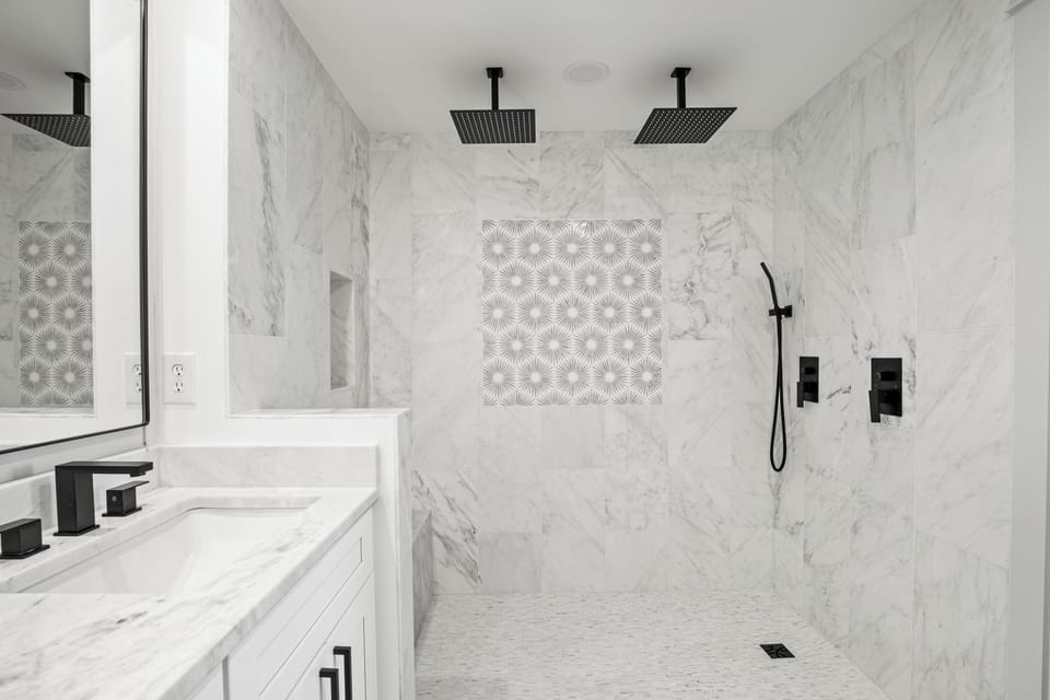 Fully renovated master bathroom with a large marble shower for two!