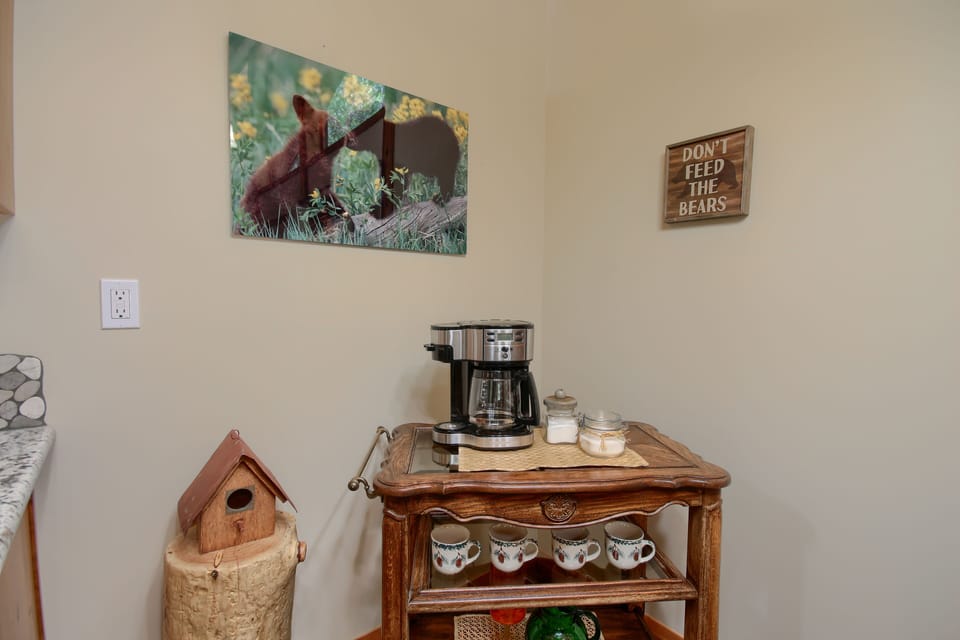 Get your morning started right with the coffee station! Drip coffee maker and mugs.