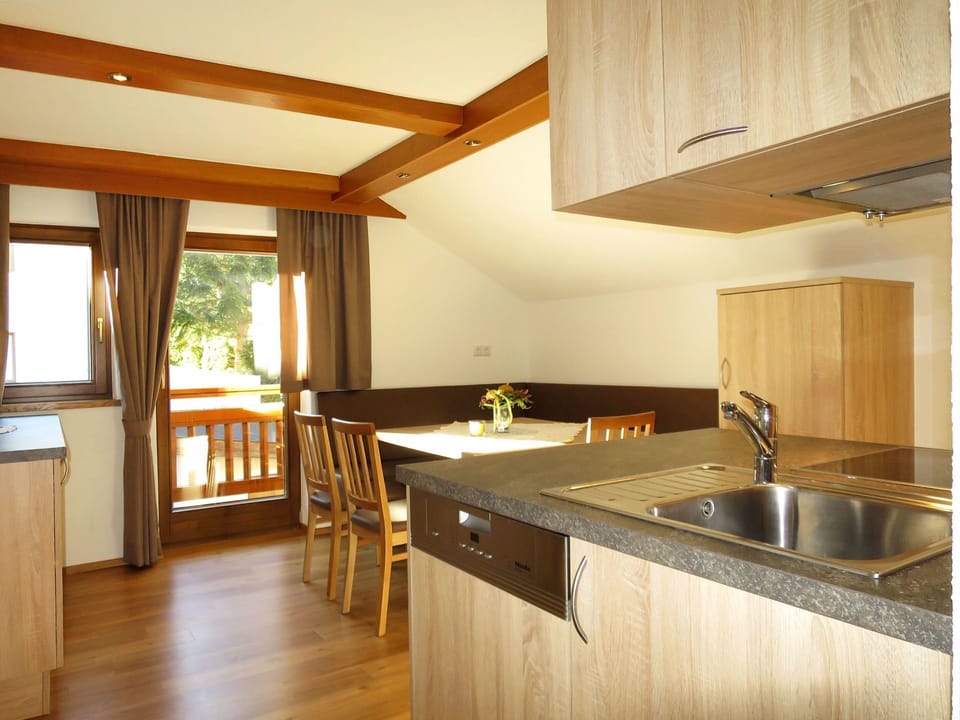 Countertop, Property, Room, Furniture, Kitchen, Cabinetry, Building, Floor, Interior Design, Hardwood