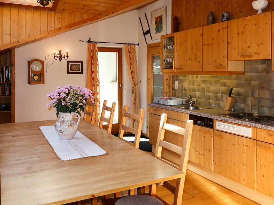 Table, Cabinetry, Property, Furniture, Picture Frame, Flower, Plant, Countertop, Wood, Chair
