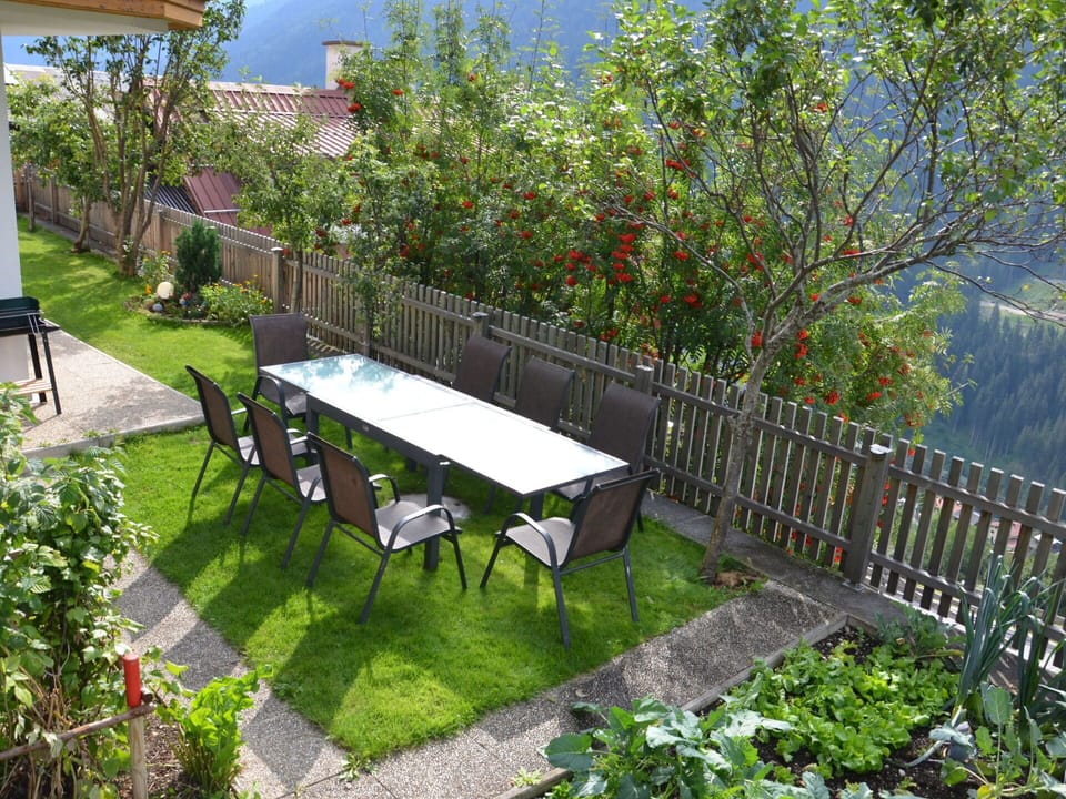 Plant, Flower, Table, Property, Furniture, Building, Tree, Outdoor Furniture, Outdoor Table, Shade