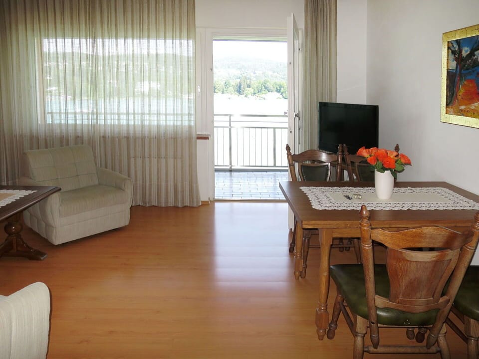 Property, Furniture, Table, Wood, Interior Design, Picture Frame, Floor, Flooring, Curtain, Living Room