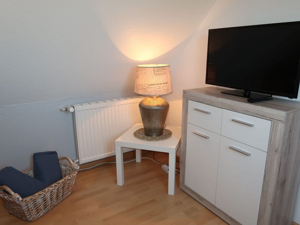 Furniture, Cabinetry, Wood, Comfort, Lighting, Interior Design, Floor, Flooring, Wall, Drawer