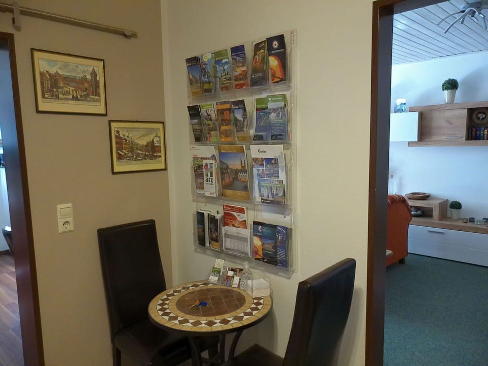 Furniture, Picture Frame, Property, Table, Building, Wood, Interior Design, Chair, Living Room, Shelving