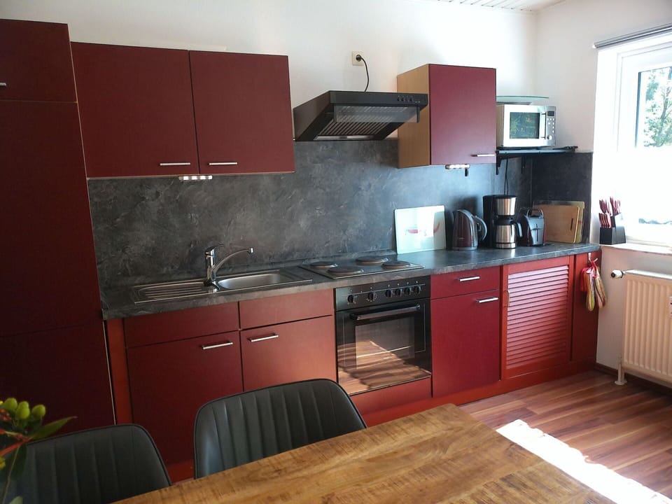 Cabinetry, Countertop, Property, Sink, Kitchen Stove, Tap, Kitchen, Kitchen Sink, Home Appliance, Kitchen Appliance