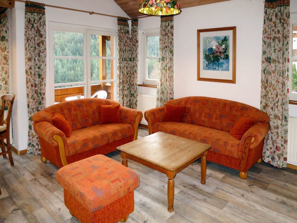 Furniture, Room, Living Room, Property, Orange, Couch, Interior Design, Floor, Table, Building