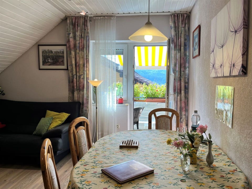 Furniture, Property, Table, Building, Window, Plant, Textile, Flower, Interior Design, Chair