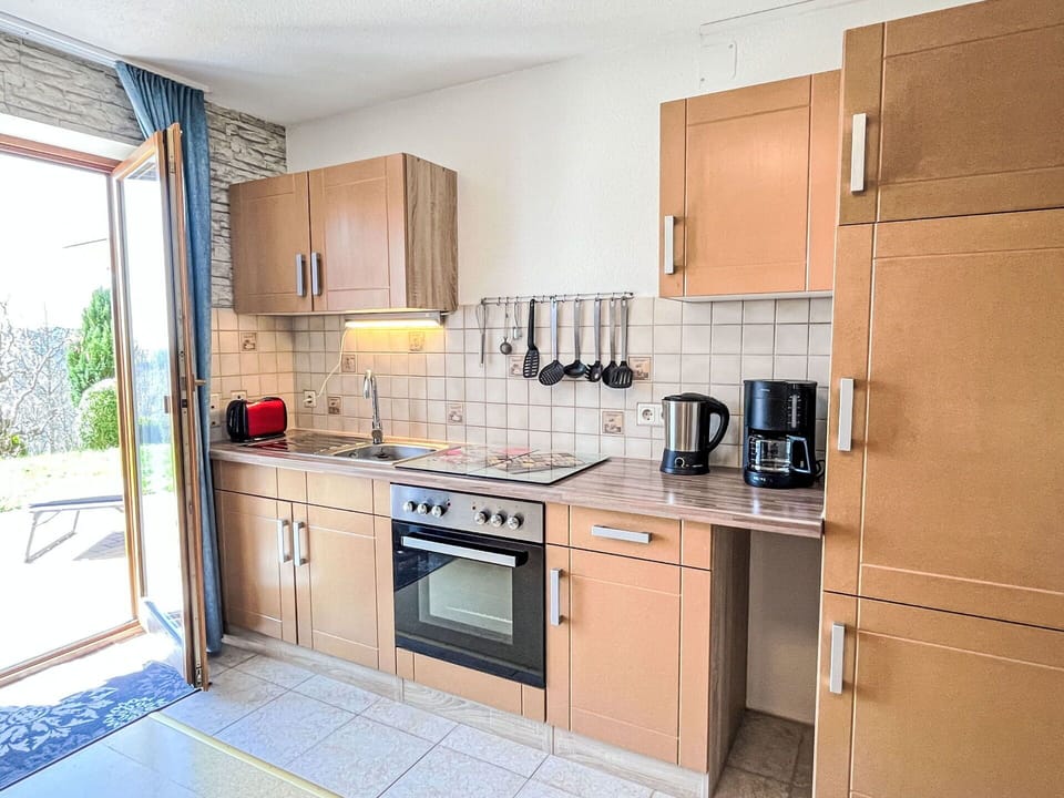 Kitchen Appliance, Kitchen, Countertop, Cabinetry, Major Appliance, Furniture, Kitchen Sink, Wood, Flooring, Sink