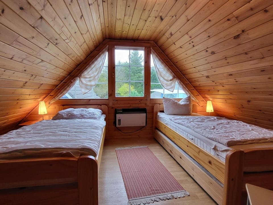 Furniture, Interior Design, Flooring, Floor, Wood, Table, Room, Ceiling, Lighting, Apartment