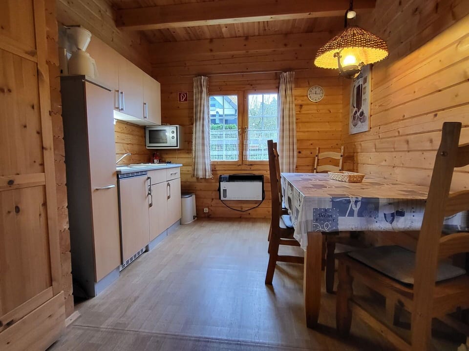 Furniture, Interior Design, Flooring, Floor, Wood, Table, Room, Ceiling, Lighting, Apartment