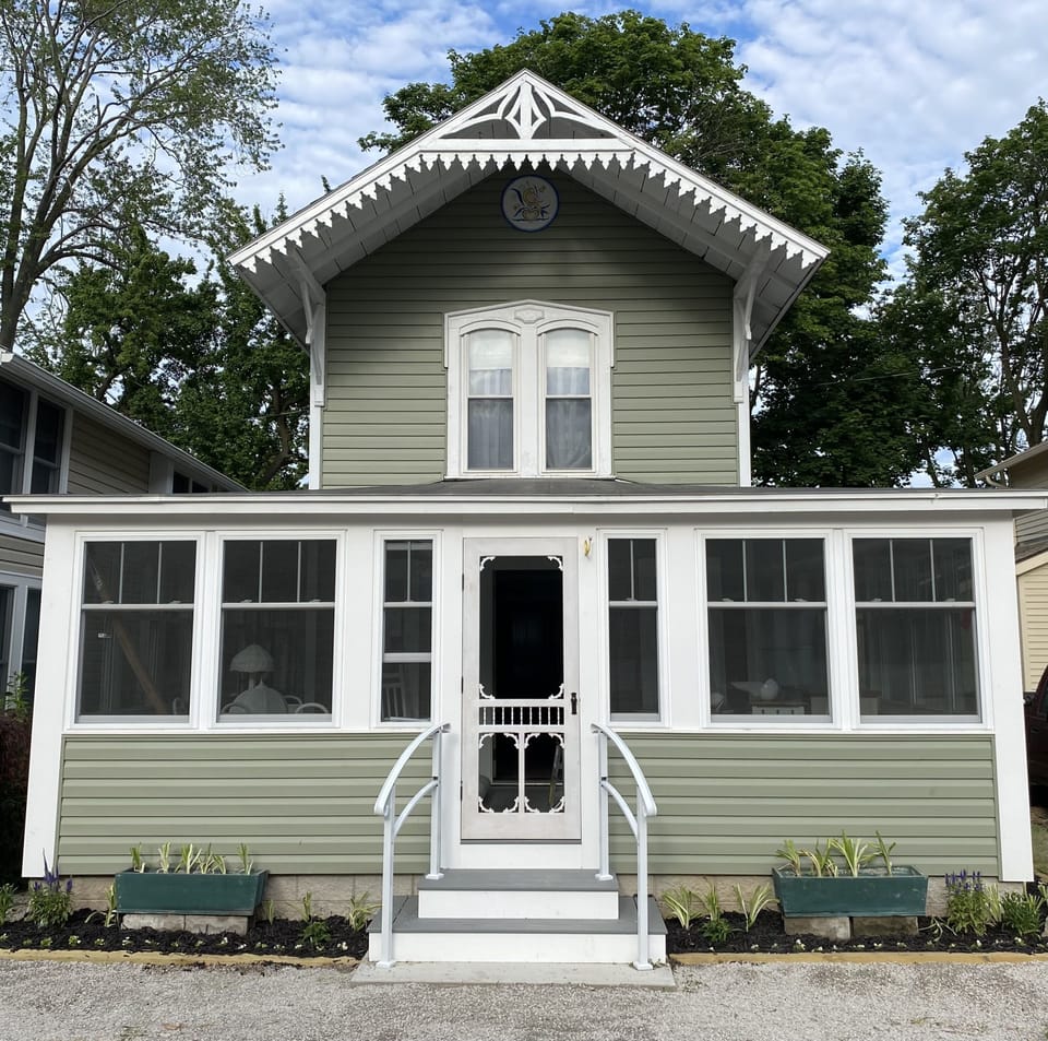 Parking for 2 cars in front of large wrap around porch.
