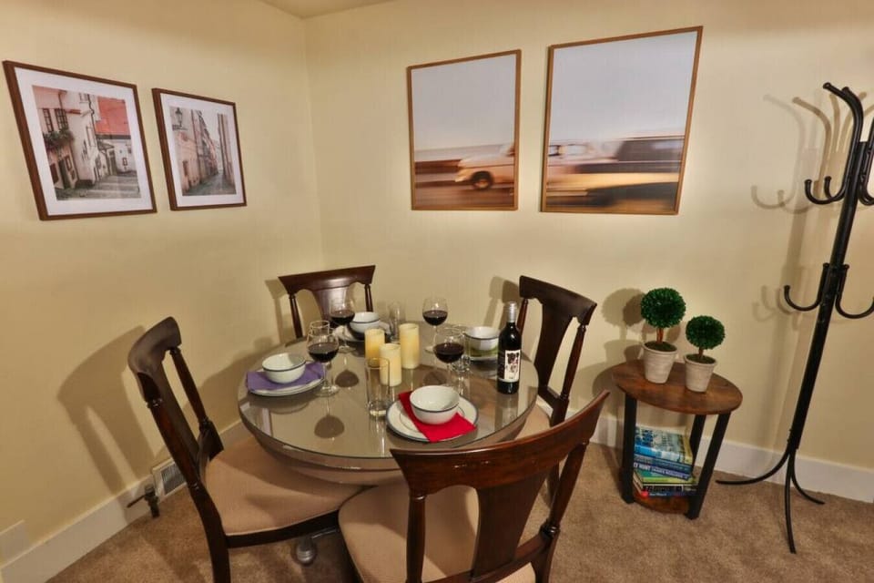 Dining area located in corner of upstairs apartment living room