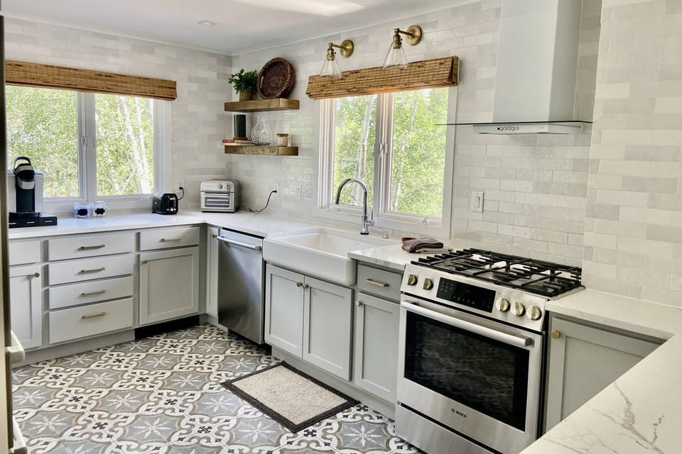 This beautifully remodeled kitchen is fully stocked with everything you need to prepare great meals during your stay.