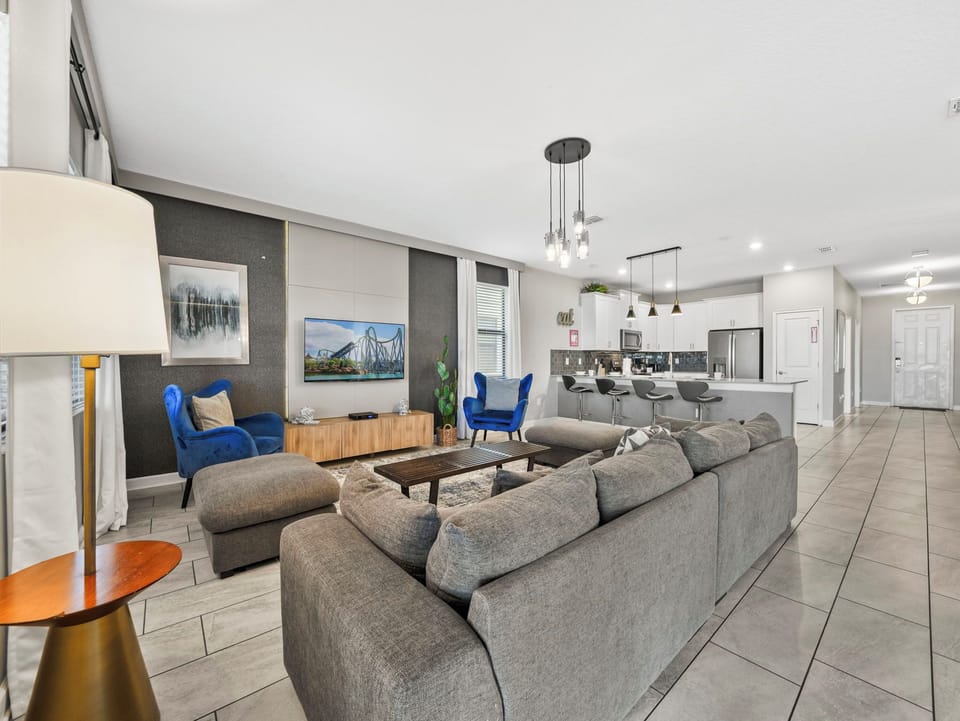 A cozy and elegant living space for comfort and connection – the perfect place to enjoy your favorite entertainment together.