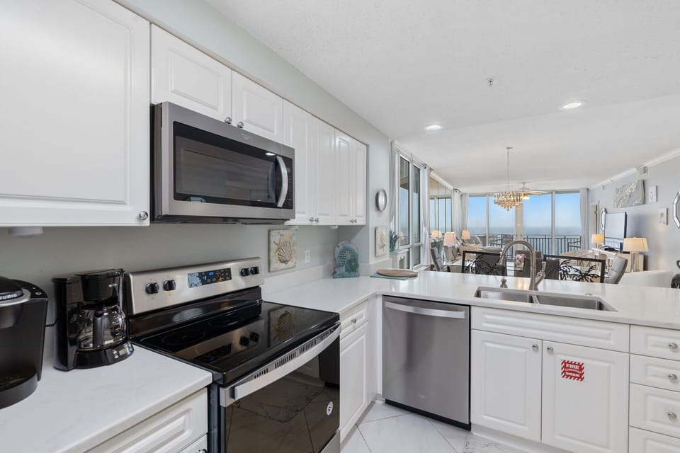Kitchen features both a Keurig and a Mister Coffee. Great view from kitchen.