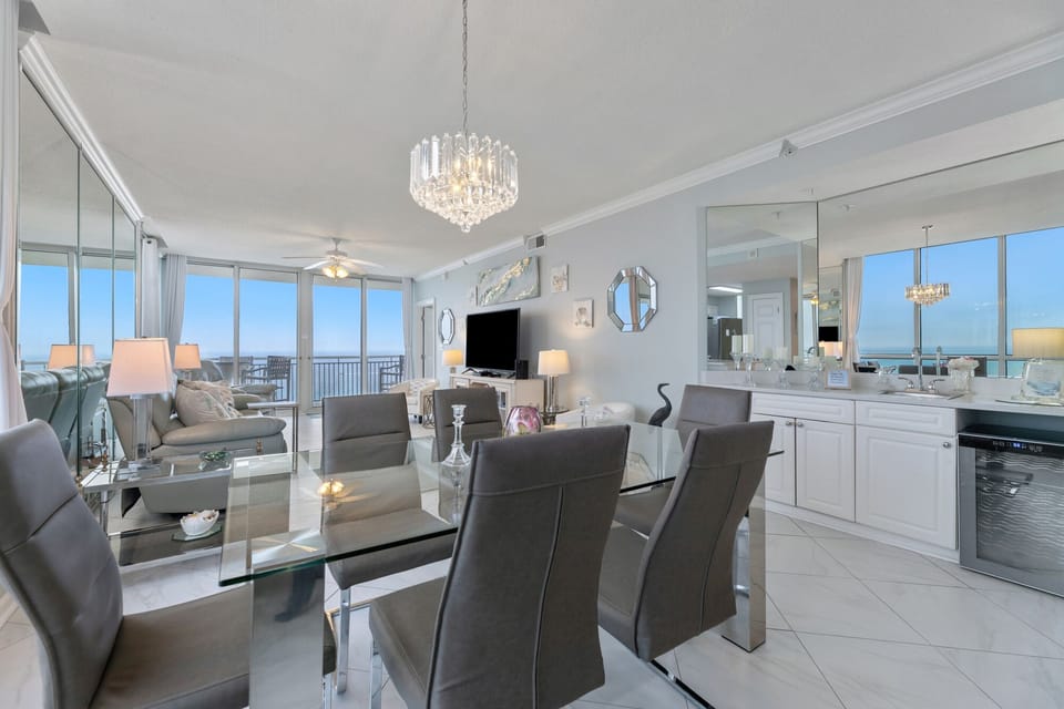 A look at the dining room. A small refrigerator is on the right.