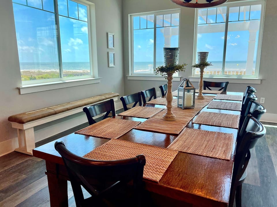 Plenty of seating around a huge table lets the whole family sit and eat together.
