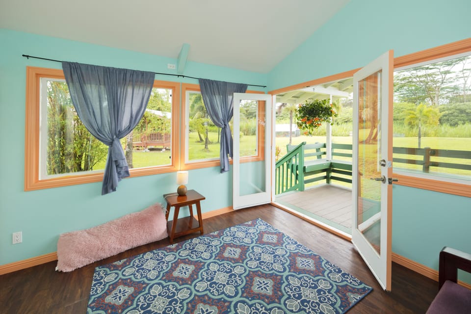 Two bedrooms with Queen size beds overlooking the fish pond.