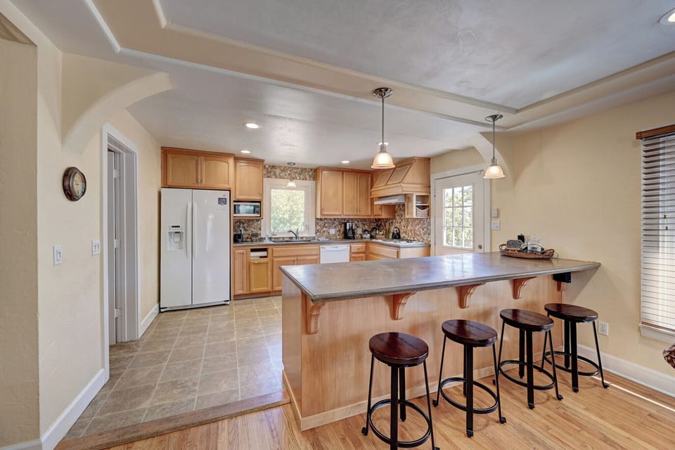 Kitchen with island and bar seating