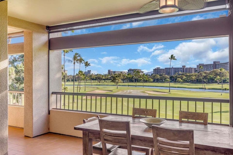Dine al fresco with stunning golf course views and island breezes