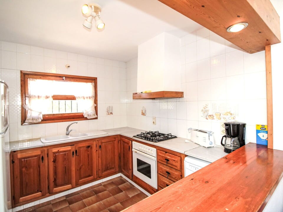 Kitchen, Countertop, Wood, Interior Design, Cabinetry, Flooring, Ceiling, Major Appliance, Furniture, Floor