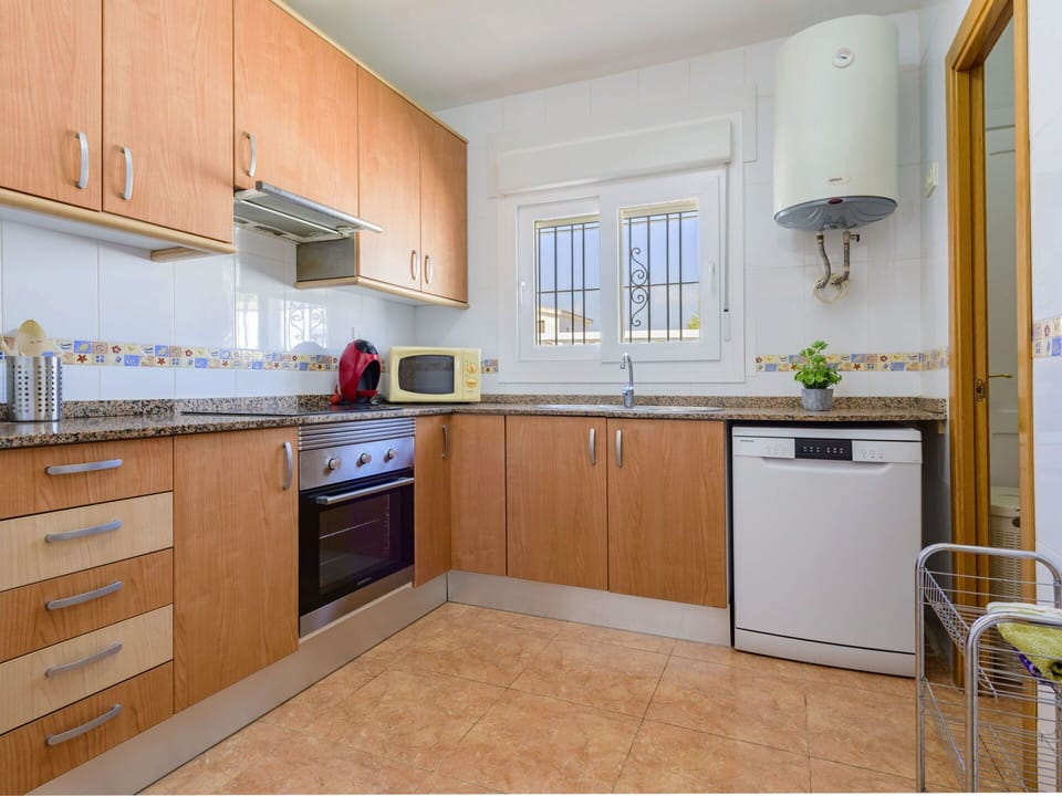 Countertop, Cabinetry, Property, Furniture, Kitchen Sink, Sink, Kitchen, Kitchen Stove, Kitchen Appliance, Wood