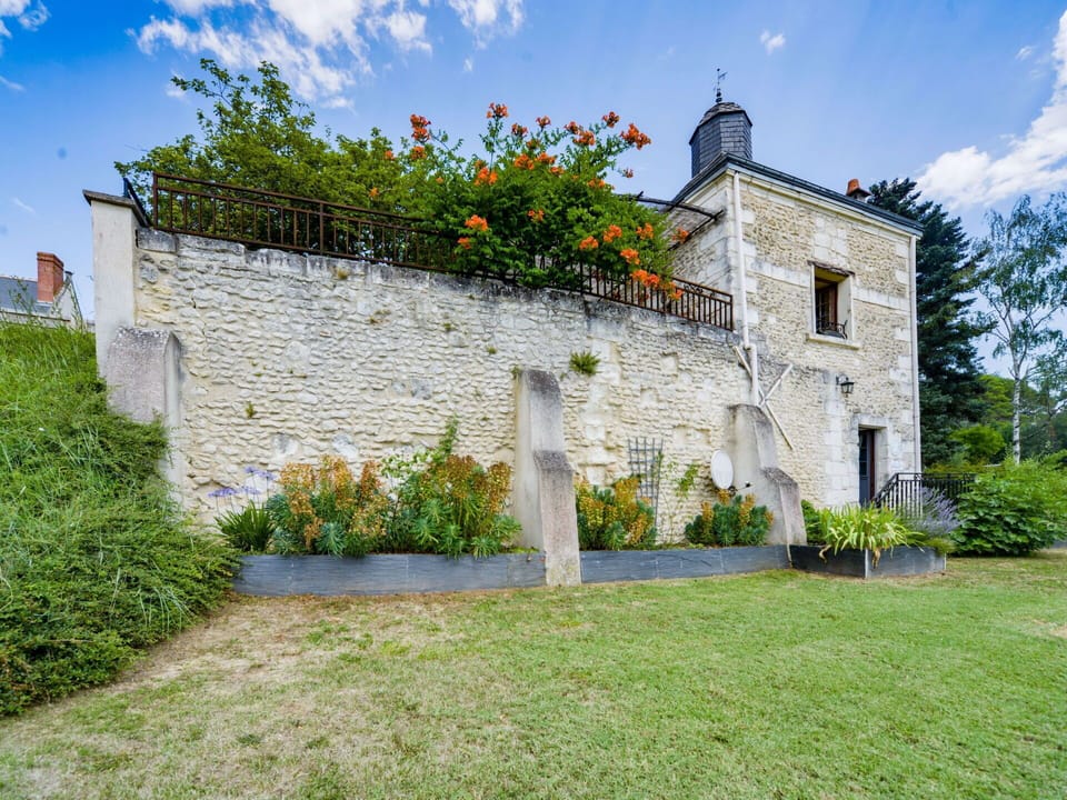 Cloud, Sky, Plant, Building, Window, Land Lot, Vegetation, Architecture, Natural Landscape, Grass