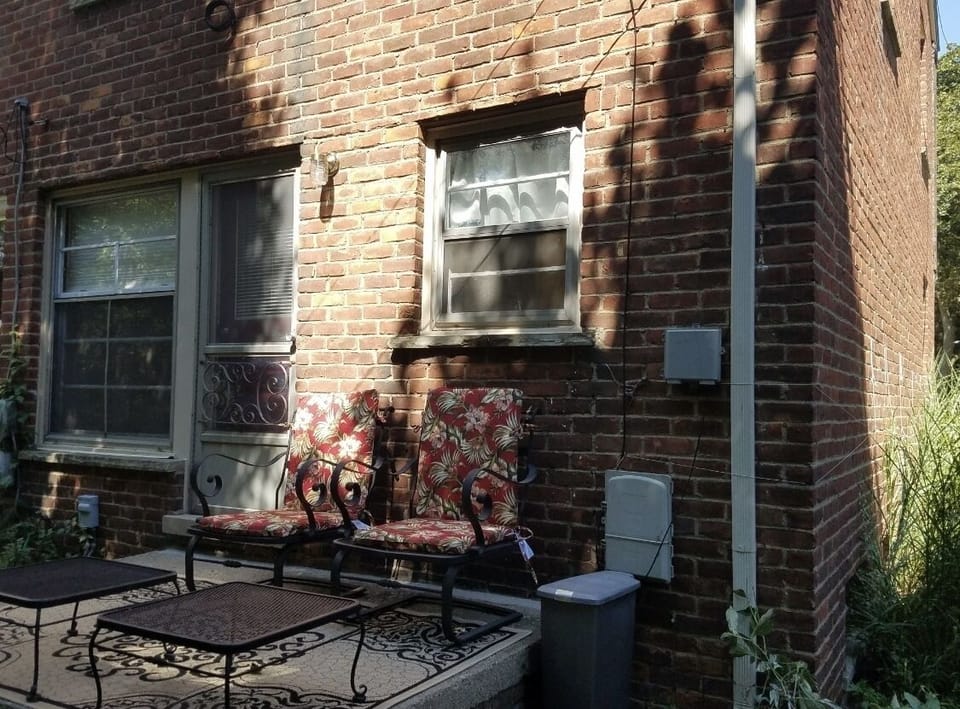Outdoor patio with furniture.