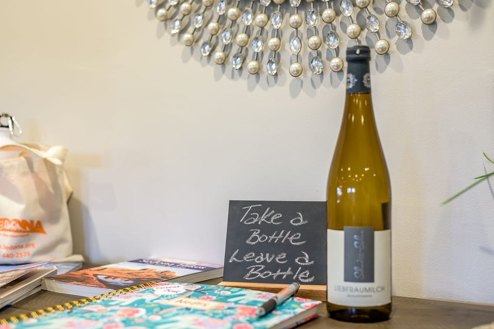 Take a Bottle, Leave a Bottle - And Don't 
Forget to Sign the Guest Book
