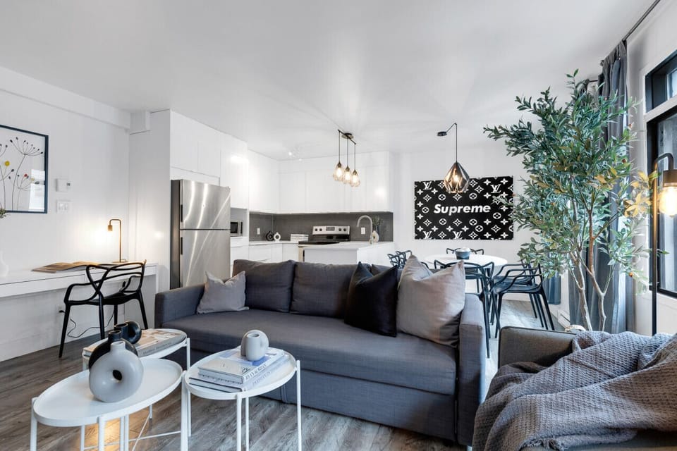 Living Room: Features 2 queen-size sofa beds with Art Deco, and a Smart HD TV with Netflix, YouTube, and Prime.