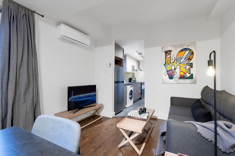 Living Room: Features a sofa bed, Smart HD TV with Netflix, YouTube, and Prime.