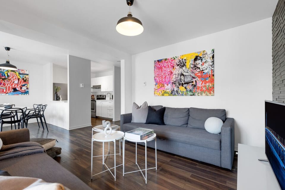 Living Room: Features 2 queen-size sofa beds, 1 queen air mattress, and a Smart HD TV. Log in to your favorite streaming services like Netflix, YouTube, and Prime Video.
