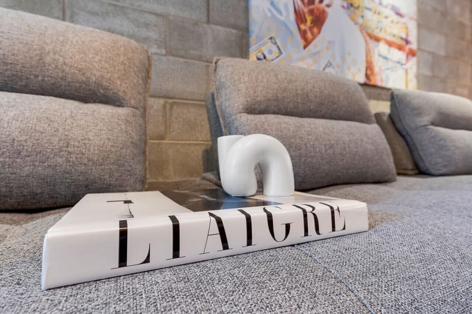 Living Room #1: Brand new, features 2 full-size sofa beds