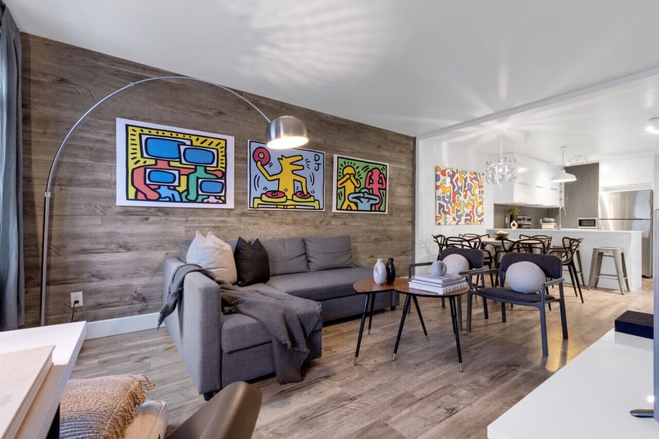 Living Room: Features queen-size sofa beds with Art Deco, and a Smart HD TV with Netflix, YouTube, and Prime.