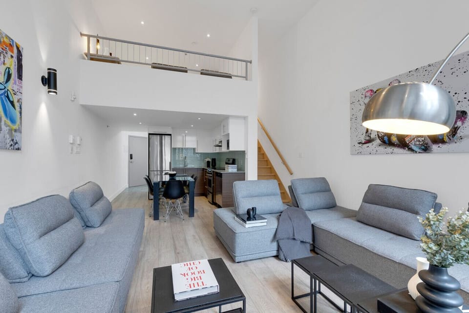 Living room: Features 4 full sofa beds and a Smart HD TV with access to Netflix, Disney+, and Prime.