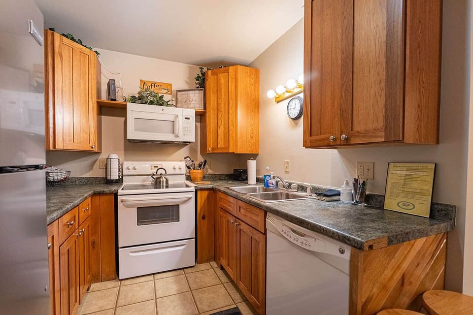 Full size kitchen. Pots, pans, dishes, glasses, mugs, silverware are included.