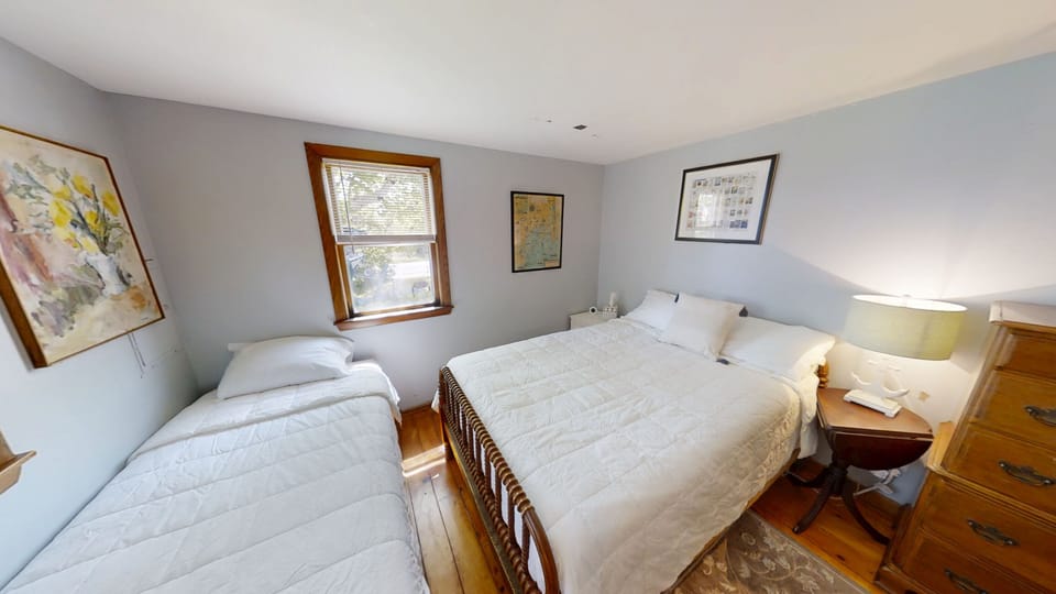 Bedroom 2 has 1 queen and 1 twin size bed.