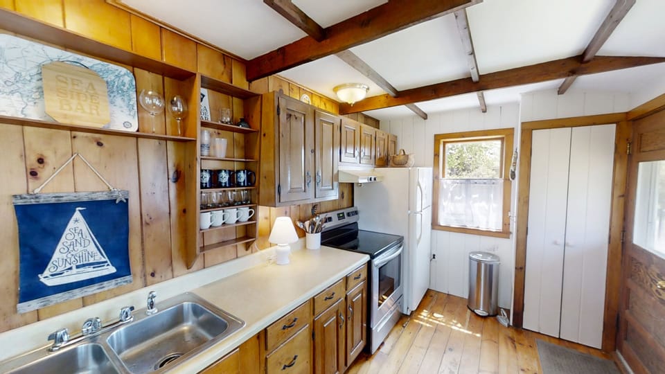 Alternate view of kitchen.