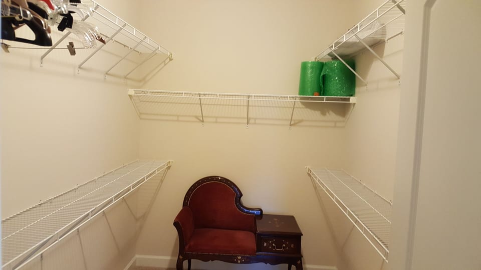 One of the two walk-in closets in the master bedroom.2nd closet is the same size