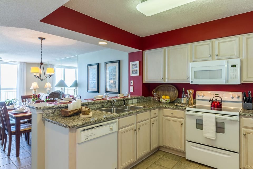 Fully stocked kitchen including a Keurig and regular coffee pot