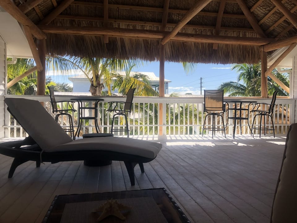 Relax under the Tiki Hut. Enjoy dinner or a breakfast. Life is just better.