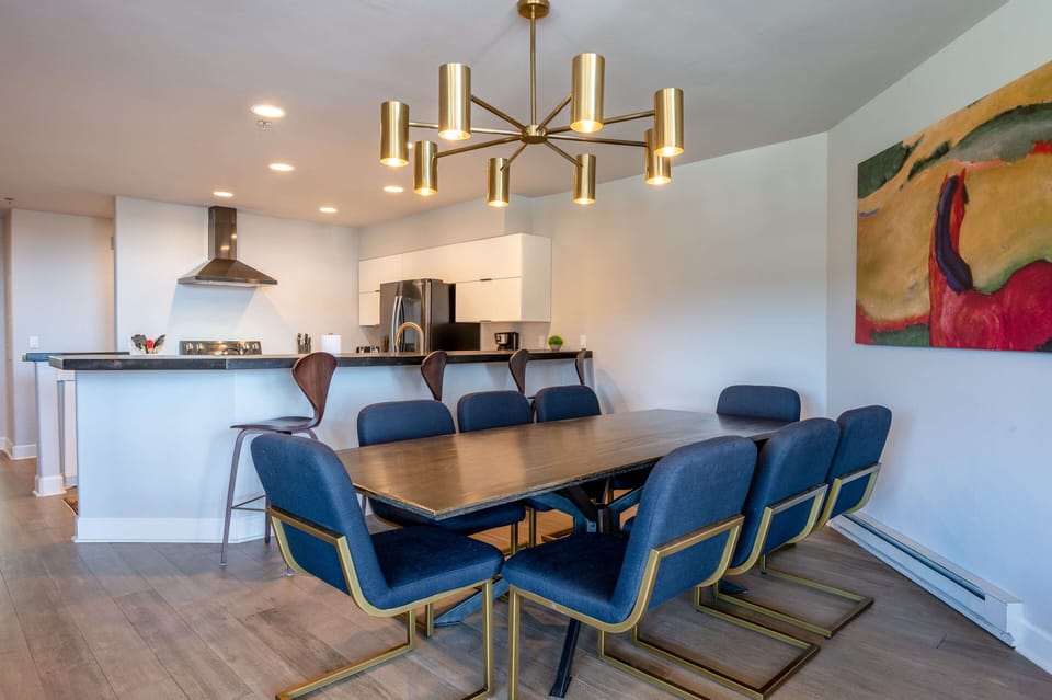 Seating for eight at the dining room table and four more at the bar